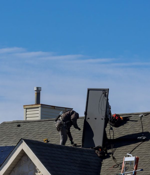 Alternative ecological energy installing solar photovoltaic panel system on roof home