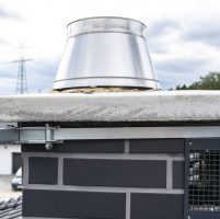 Chimney holder for mounting a satellite dish on the chimney, close-up view.